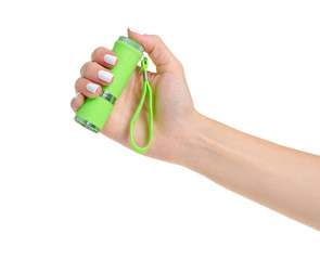 Green flashlight energy in hand on white background isolation © Kabardins photo