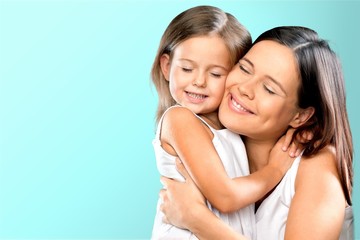 Happy Mother and daughter hugging