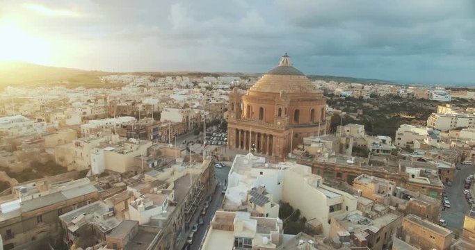 Aerial Shot Moving towards a Dome in a small Village