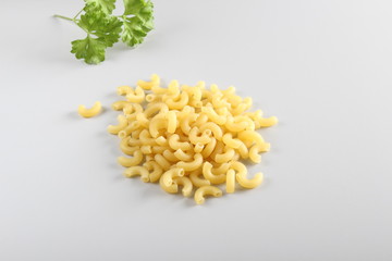 pasta elbows on a light background