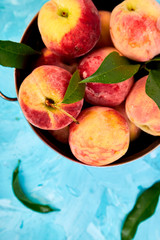 Ripe peaches in a bowl