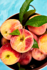 Ripe peaches in a bowl
