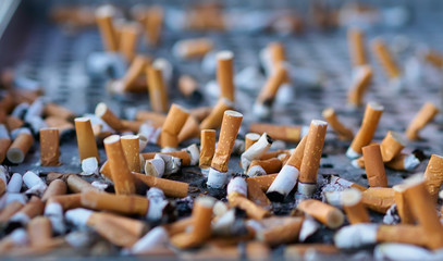 Cigarette butts, concept of dangerous and health harmful smoker lifestyle