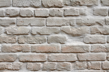 Brick wall painted in pastel color as background, texture