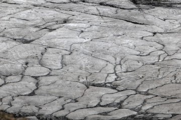 Surface of glacier ice with faults and fractures
