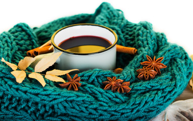 Autumn, fall leaves, hot steaming cup of glint wine