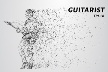 Fototapeta na wymiar Rock guitarist plays at the concert. The guitarist consists of dots and circles.