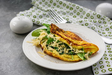 Omelette with spinach and cheese.