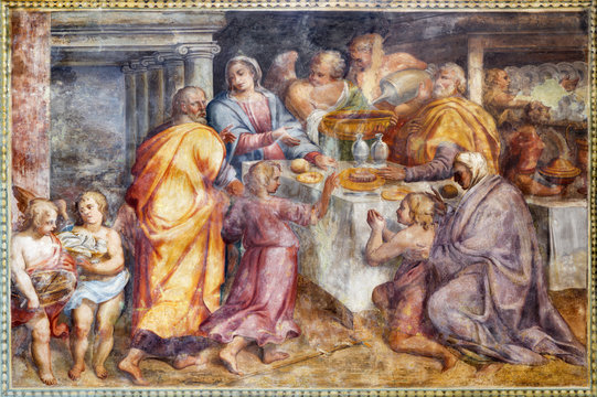 PARMA, ITALY - APRIL 16, 2018: The freso of Visitation of Holy Family at work in church Chiesa di Santa Croce by Giovanni Maria Conti della Camera (1614 - 1670).