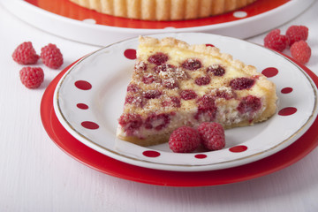 Sand cake with curd filling and raspberries