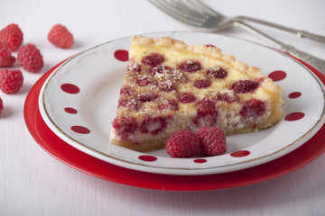 Sand cake with curd filling and raspberries