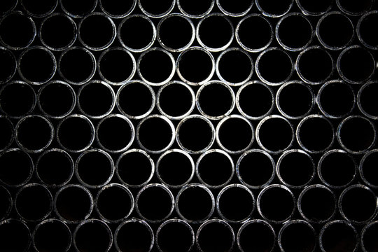 Pattern of a lot of industrial metal steel tube pipes for leading processing cutting welding and other work