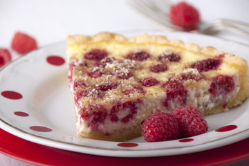 Sand cake with curd filling and raspberries