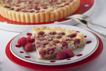 Sand cake with curd filling and raspberries