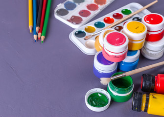 Accessories for painting. Paints, Brush and Colored Pencils