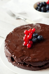Gluten free chocolate cake with berries