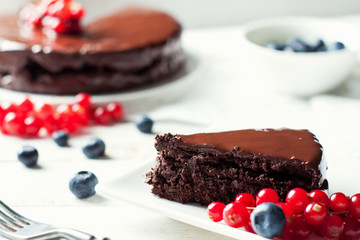 Gluten free chocolate cake with berries