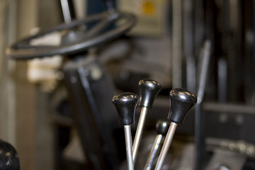 Used forklift steering wheel cockpit in an industrial company service levers gear lift up down