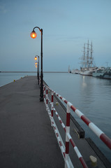 Molo w gdyńskim porcie wieczorem, Pomorze/Pier in port of Gdynia at night, Pomerania, Poland - obrazy, fototapety, plakaty