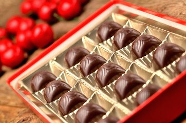 Cherry chocolate in box of chocolates with a creamy filling liquor