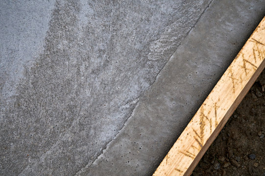 Fresh concrete and wood concrete shutter at concrete yard construction