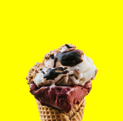 Close-up ice cream on a yellow background.