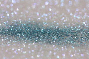 Blue and silver glitter background. Holiday, Christmas or New Year sparkling texture.