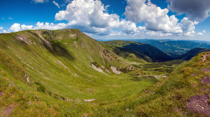 Fototapeta na wymiar Amazing mountain landscape in vivid sunny day, natural outdoor travel background. Dramatic and picturesque scene of Carpathian mountains in Ukraine.