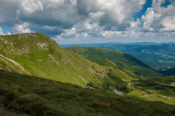 Amazing mountain landscape in vivid sunny day, natural outdoor travel background. Dramatic and picturesque scene of Carpathian mountains in Ukraine.