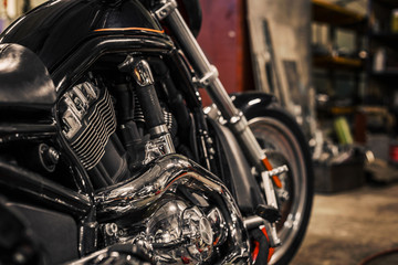 Fototapeta premium Motorcycle motor details engine. Closeup of chromed motorcycle engine. Motorcycle engine engine exhaust pipes