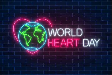 Glowing neon medicine concept sign with earth planet in heart shape. World heart day luminous banner.