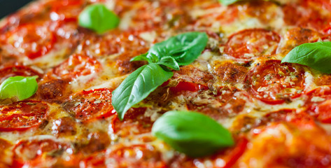  Pizza with Mozzarella cheese, Tomatoes, pepper, Spices and Fresh Basil. Italian pizza. Pizza Margherita or Margarita