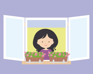 Young woman standing and smiling in an open window with flower pots and flowers, with purple facade on the wall