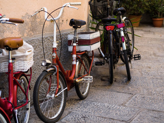old vintage bike or bicycle on a cobblestone street