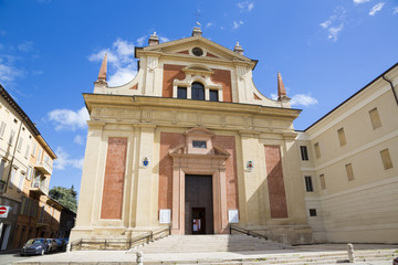 Fototapeta na wymiar Reggio Emilia - The facade of chruch Chiesa di San Pietro.
