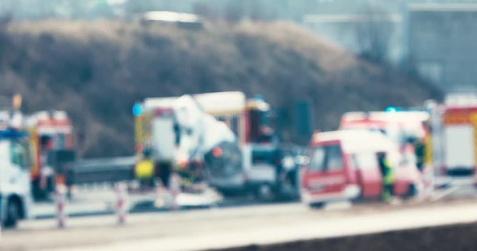 Car Accident Scene On Highway With Fire Trucks, Ambulance And Police - Out Of Facuse For Background Use