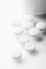 Pharmacy theme, white medicine tablets antibiotic pills.