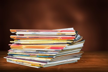 Pile of newspapers on background