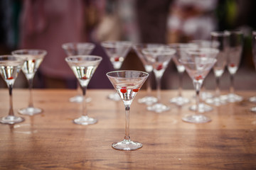 Champagne glasses on gold background. Party and holiday celebration concept
