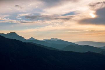 Obraz na płótnie Canvas Scenic lanscape view of beautiful mountains on sunset at dusk. Rysy mountains, Hight Tatry, Poland, Slovakia