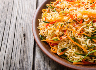 Asian noodles salad in bowl
