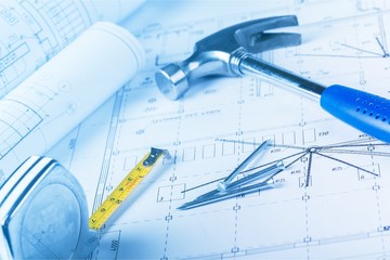 Blueprints and a hammer