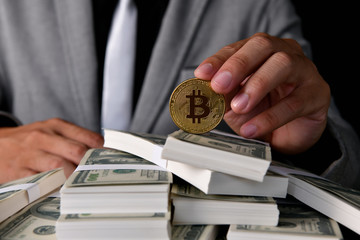 Finance Business Concepts. Lots of money on a black background. Investments are a necessity of business.