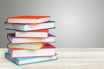 Colorful books collection on desk