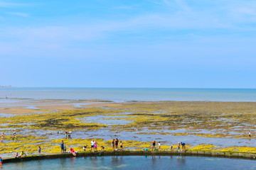 British seaside in summer. Minnis Bay tidal pool. Birchington, Kent, UK