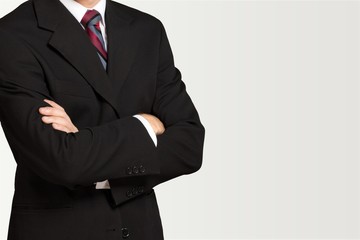 Obraz na płótnie Canvas Confident business man wearing elegant suit