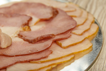 Sausage cuts of different varieties on a plate.