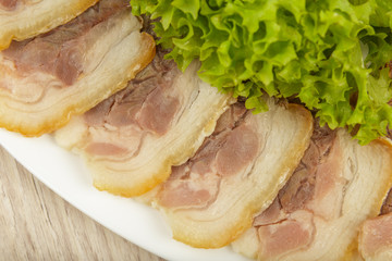 Sausage cuts of different varieties on a plate.
