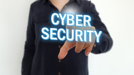 Businesswoman pointing finger on cyber security text