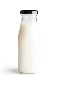 Milk bottle on white background